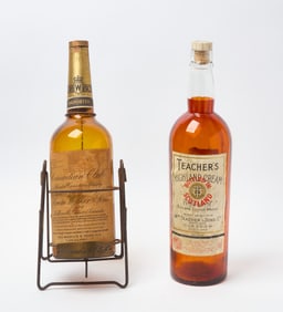 Two Whiskey Advertising Bottles