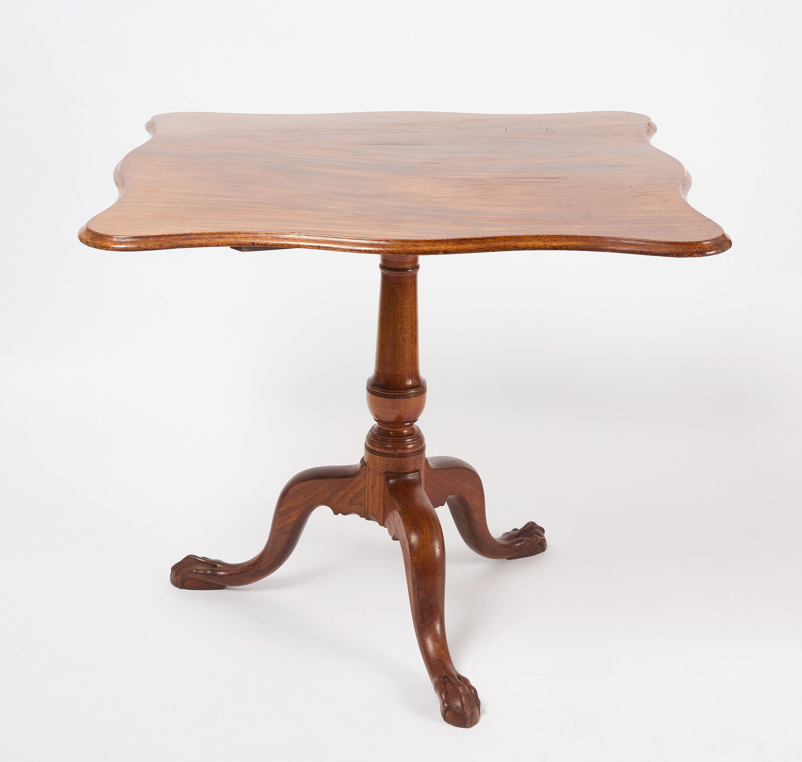 Tilt Top Mahogany Tea Table: Queen Anne ilt top tea table. Shaped top with claw feet. American, circa 1780. H 30 in. W 34 in. D 34 in.