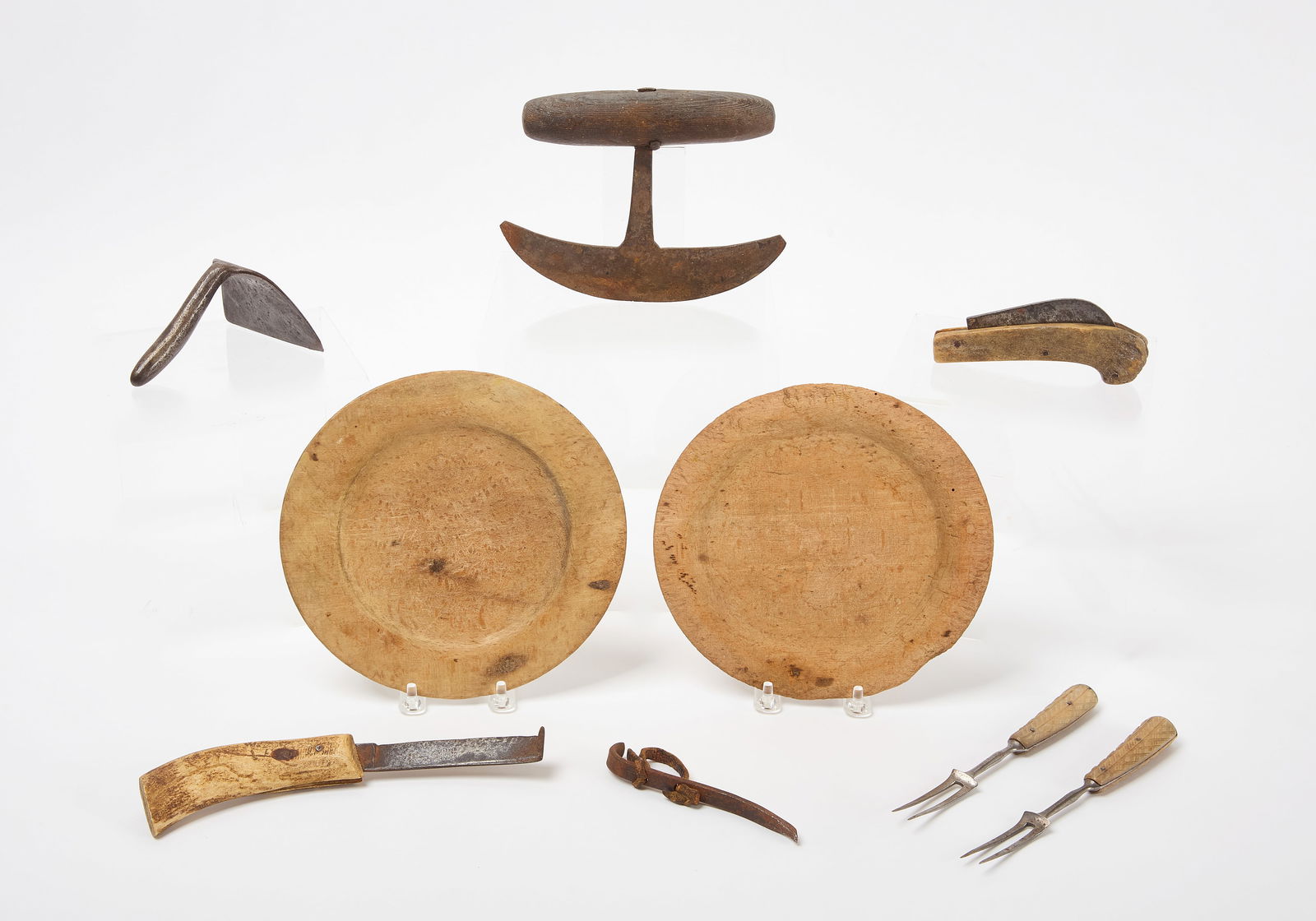 Group of Wood and Bone Utensils: Group of wood and bone utensils. two wooden plates, two bone-handled forks, two bone knives (one stamped Sheffield England), 1 iron dough scraper, Chopper and 2 iron cutting implements. Early 19th cen