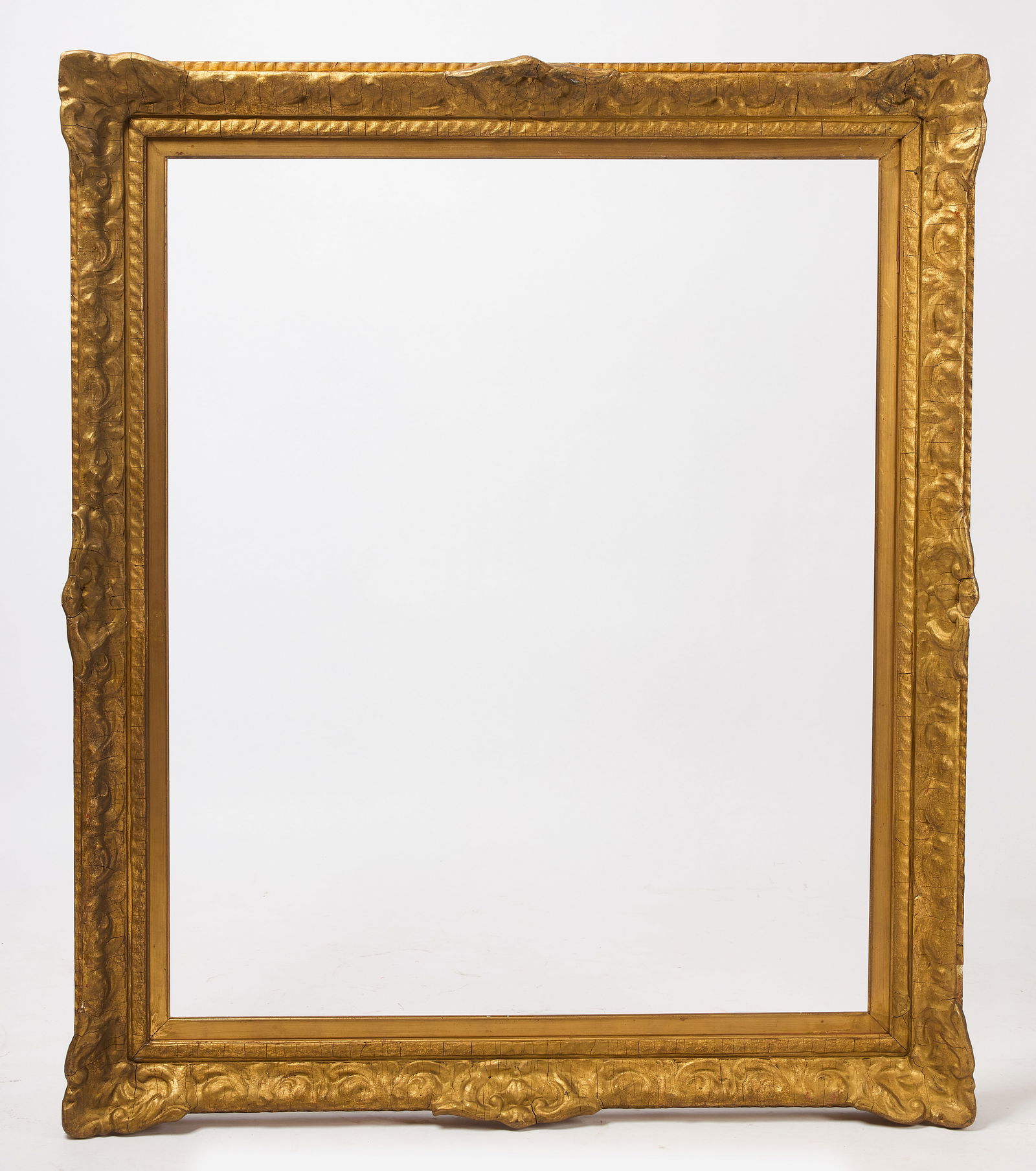 Carved Gilt Frame: Carved Gilt Frame. Frame: H 54 in. W 45-1/2 in. Rabbet: H 44-1/4 in. W 36-1/4 in.