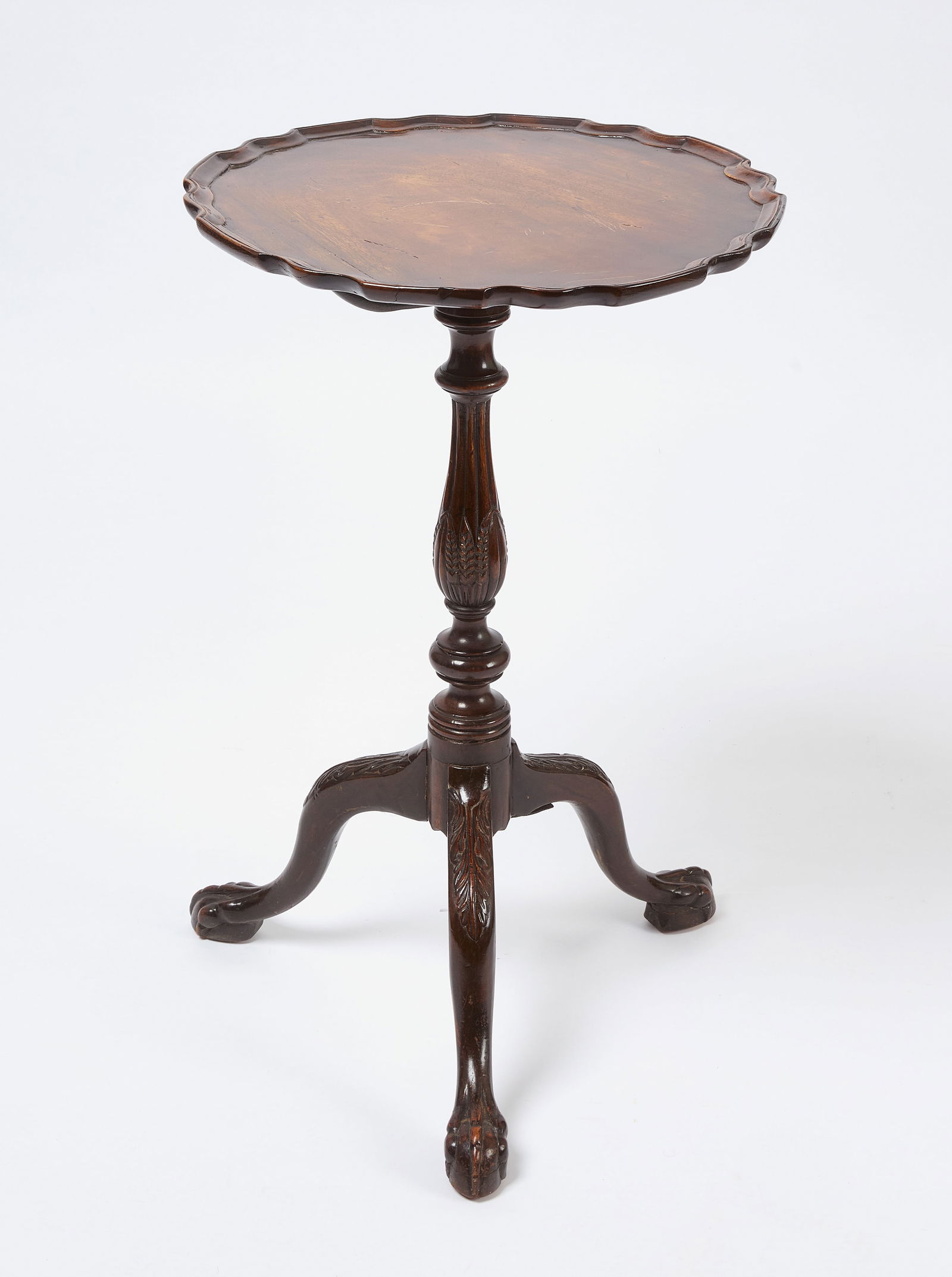 Tilt Top Stand: Mahogany tilt top table. English, 19th century. H 28-1/2 in. D 18 in. Condition: Original condition with imperfections in the top. 