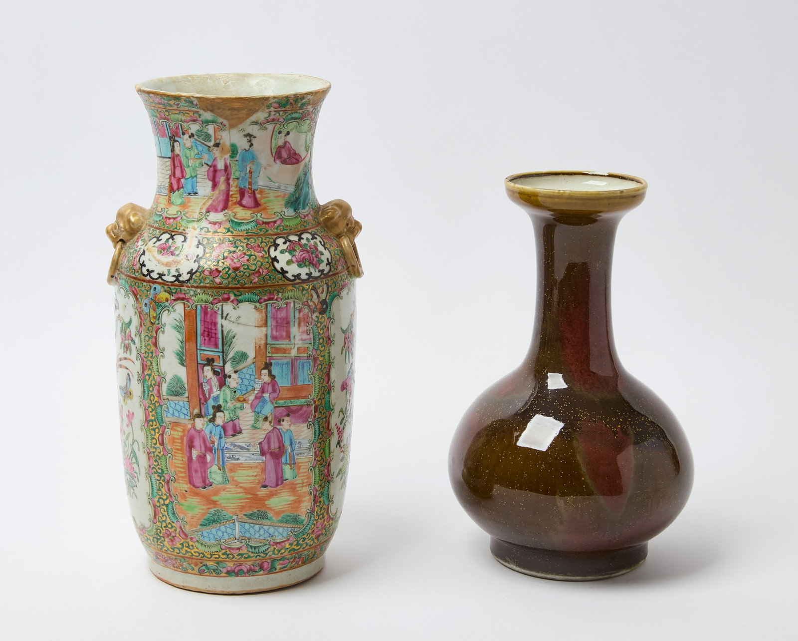 Two Chinese Vases: Two Chinese porcelain vases. The first Rose Medallion vase with lion mask handles, mid 19th century. The second vase with flared rim and complex glaze. 20th century. Rose Medallion: H 14 in. Fla