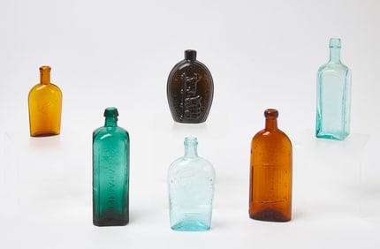 Group of Historical Bottles and Flasks