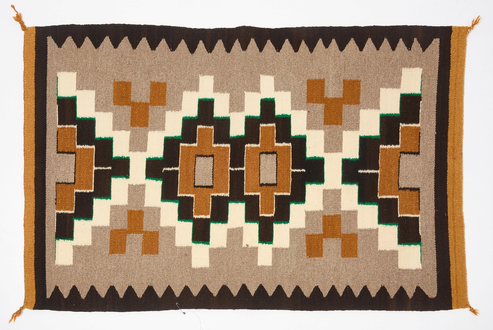Navajo Ganado Area Rug and Woven Rug: Navajo woven rug. Southwestern U.S., circa 1940. Together with a Navajo woven Ganado area rug. Southwestern U.S, circa 1930. L 49 in. W 32 in. L 46-1/2 in. W 30-1/2 in.