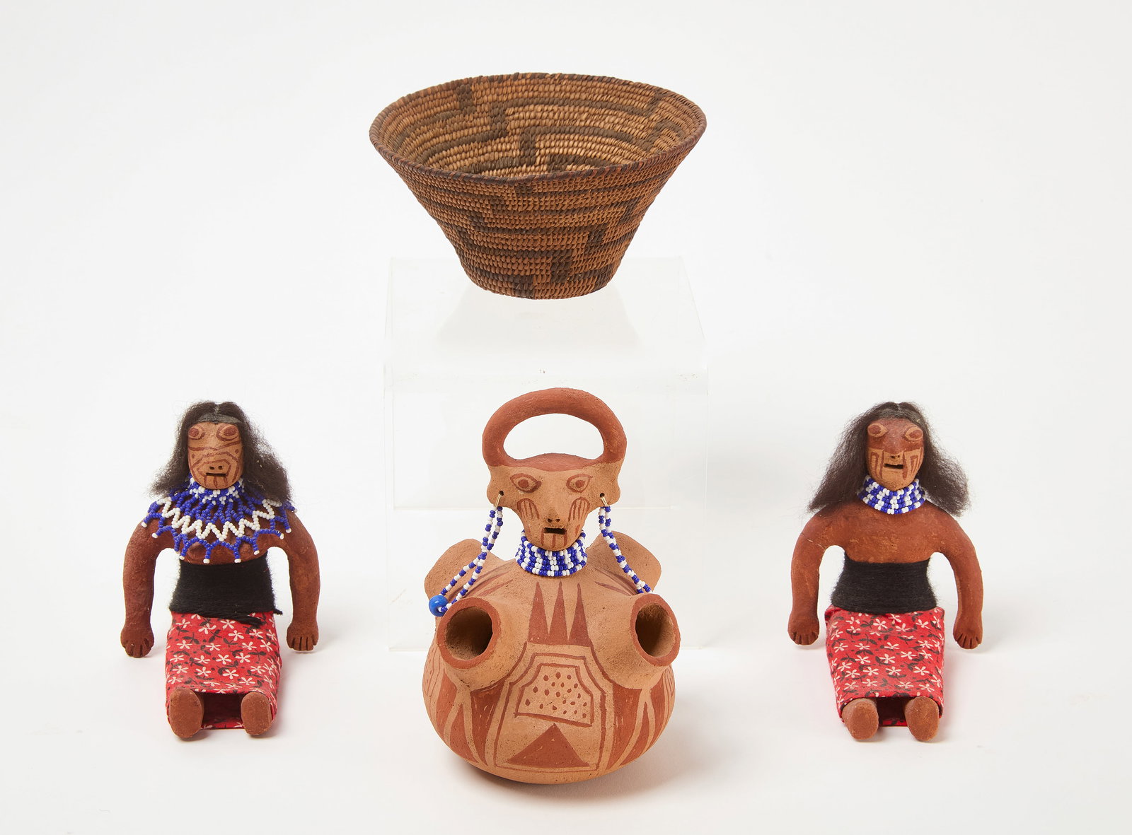 Elmer Gates Figures and Basket: Group of Elmer Gates. Includes a figure, jar, and Pima basket. Figure: H 5 in. W 5 in. Jar: 6-1/2 in. D 5-1/2 in. Basket: H 3 in. D 6-1/2 in. Condition: No damage noted. Link for high-res i