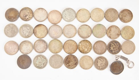 Group of 34 US Silver Dollars