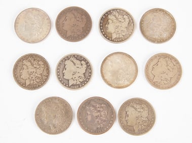 Group of 11 US Morgan Silver Dollars