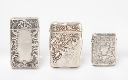 Three Sterling Silver Match Vestas