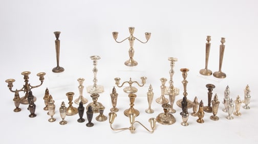 Collection of Weighted Sterling Candlesticks and Casters
