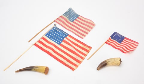Two Powderhorns and Three U.S. Flags