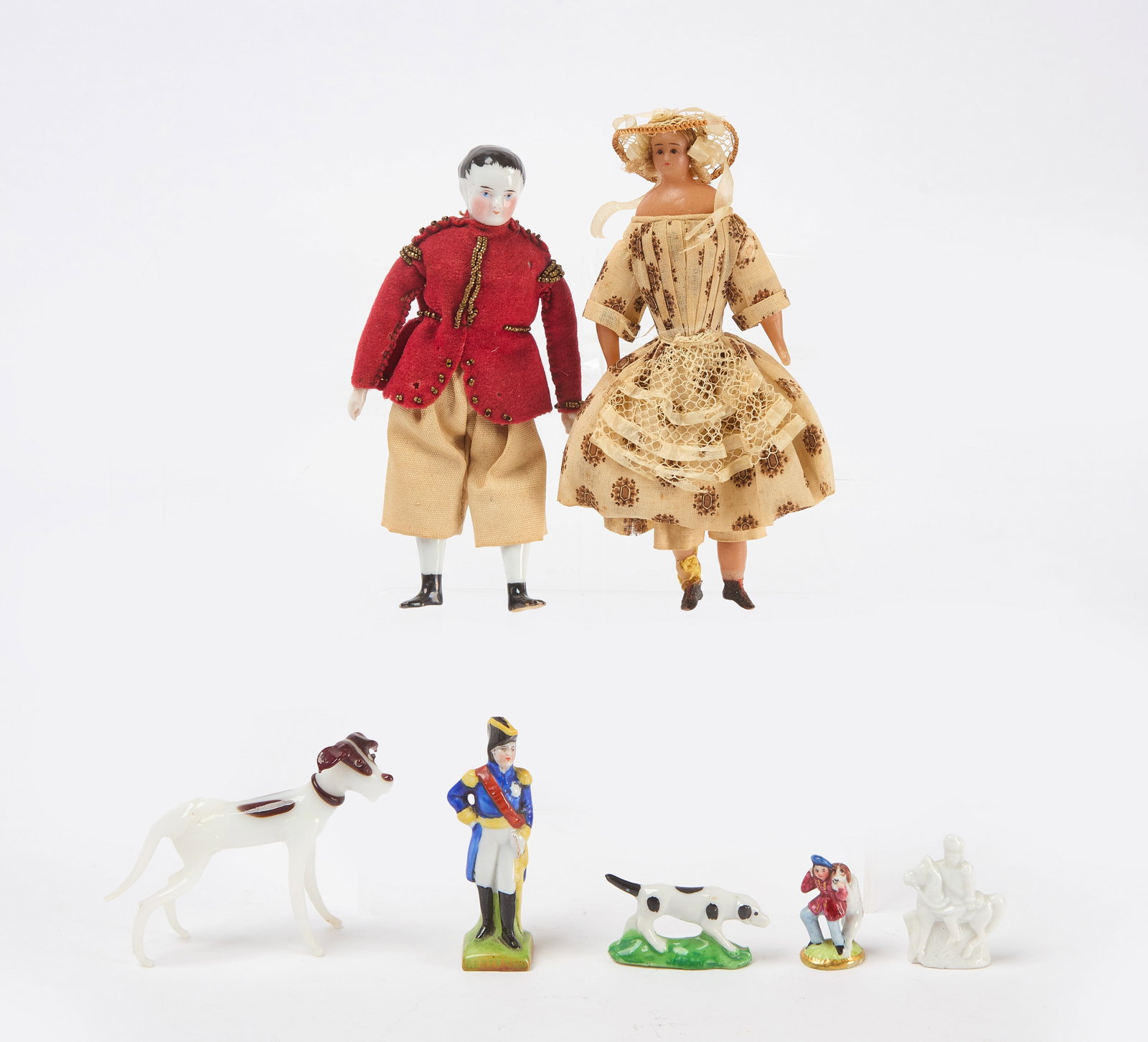 Group of Dollhouse Figures and Animals: Group of dollhouse figures one with painted porcelain head and limbs, porcelain and glass animals, and others as shown. Smallest: H 1-3/8 in. Largest: H 6-1/4 in. Provenance: Collection of Nancy Stass