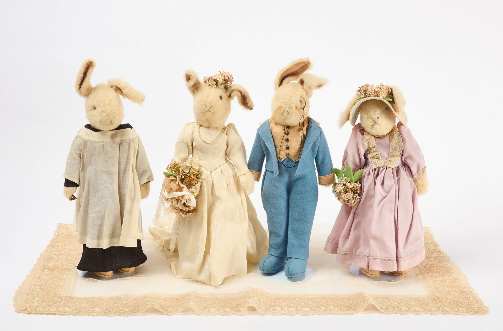 Rabbit Wedding Party of Four: Rabbit Wedding Party consisting of Bride, Groom, Vicar, and Maid of Honor. Original hand-made costumes. (each): H 15 in. Stands included as shown.