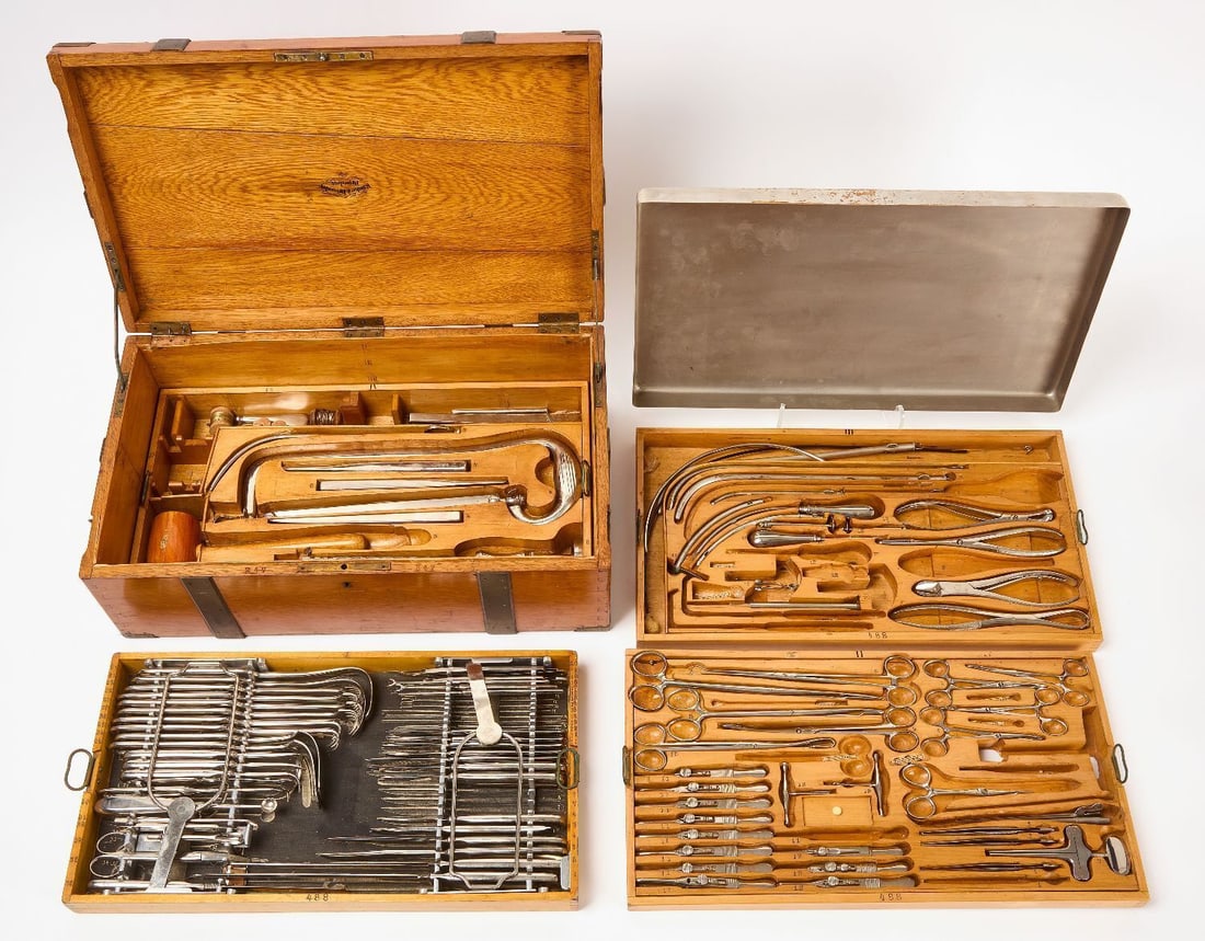 Knoke & Dressler Cased Surgical Suite: Knoke & Dressler (Dresden, Germany) 4-tray surgical suite, consisting of amputation saw, blades, trepanning tools, and others as shown. early 20th century.Case: H 7 in. W 20 in. D 11-1/2