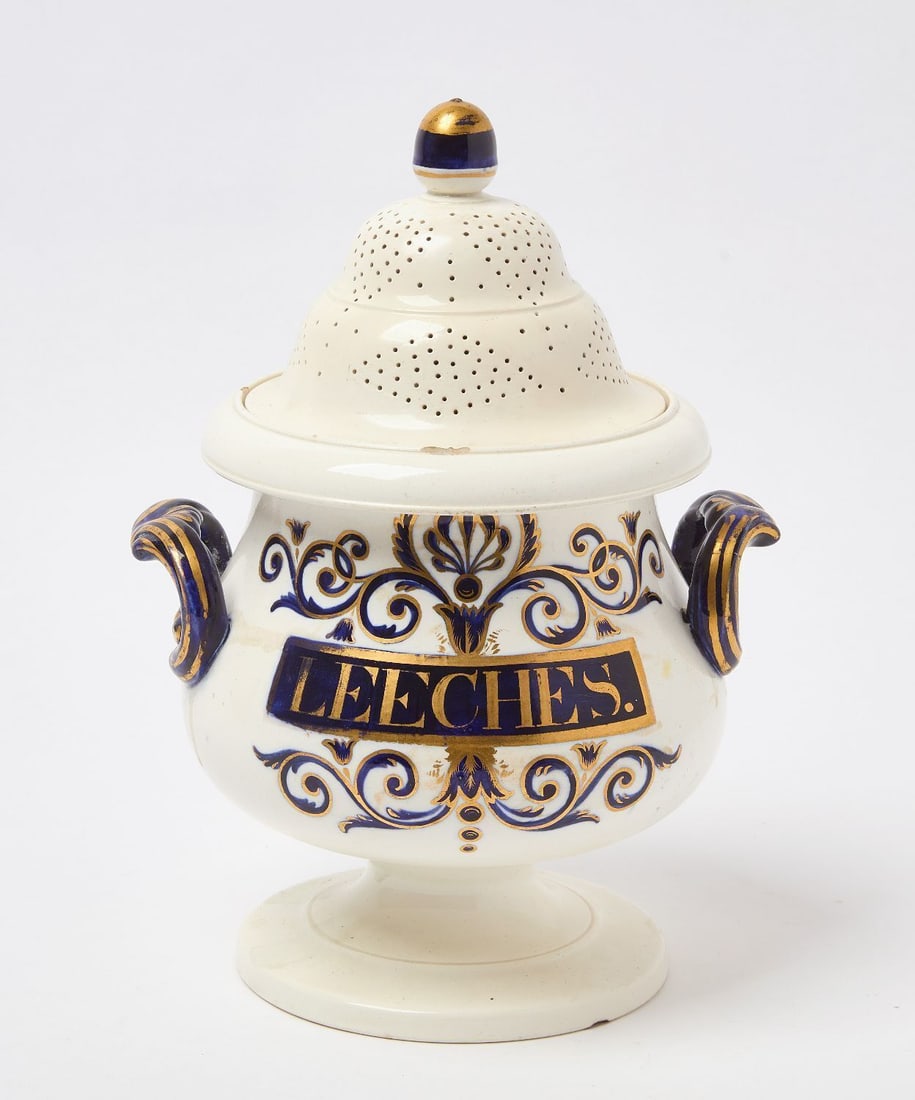 Apothecary Leeches Jar: Staffordshire apothecary Leeches jar with lid. Attributed to Samuel Alcock. Earlthenare with cobalt blue and gilt decoration. English, early 19th century.H 12-1/4 in. 