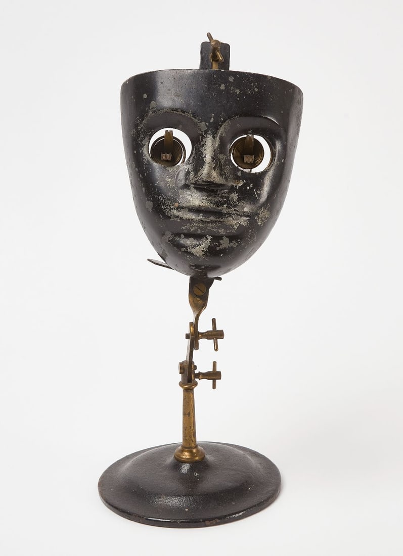 Opthalmophantome: Opthalmophantome. Iron, metal and brass. Circa 1900.H approx 15 in. H face: 6-1/4 in.