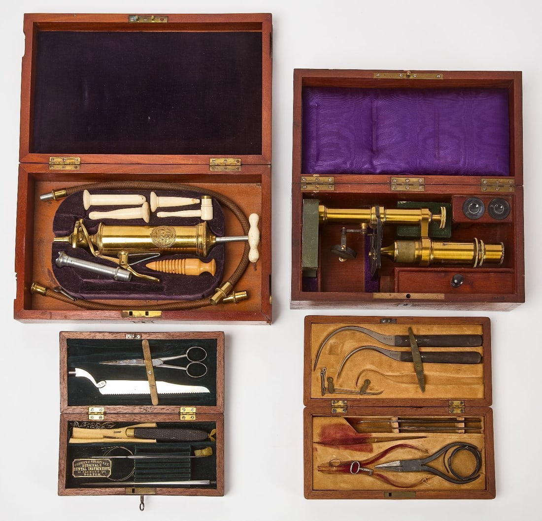 Group of Four Cased Scientific and Surgical Instruments: Group of four cased scientific and/or surgical instruments. Hassam Cutlery set, Codman & Shurtleff (Boston) surgical set, brass microscope (no name visible), and S. Maw Son & Thompson cased en