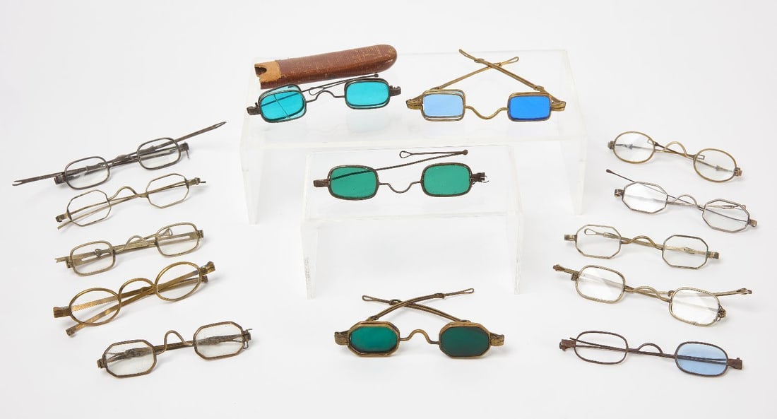Group of Antique Octagonal and Sharp Shooter Eyeglasses: Group of antique octagonal spectacles and three Civil War era sharp shooter eyeglasses with tinted glass lenses. Comprised of various materials including brass and early glass. England and Americ