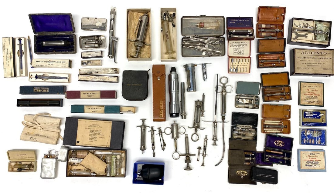 Large Group of Antique Syringes and Medical Injection Kits: Large group of approximately 20+ antique medical injection supplies representing various manufacturers. Includes emergency anesthesia kits, syringe sterilizing cases, Yale tuberculin syringes,