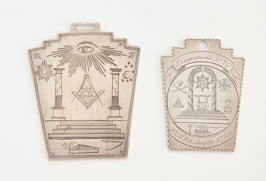 Two Early Masonic Medallions in Keystone Form: Two early Masonic medallions in keystone form. The first with various Masonic symbology and all-seeing-eye, inscribed to Joseph Rittenhouse, dated AL 5824 (1824 AD). Together with a smaller medallion
