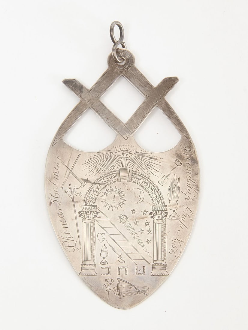 Early Masonic Medallion - Friendship Chapter No. 56: Early Masonic medallion inscribed to Phineas Holmes, Friendship Chapter No. 56. Front side depicts various Masonic symbology such as the all-seeing-eye, columns with connecting arch, shooting comet an