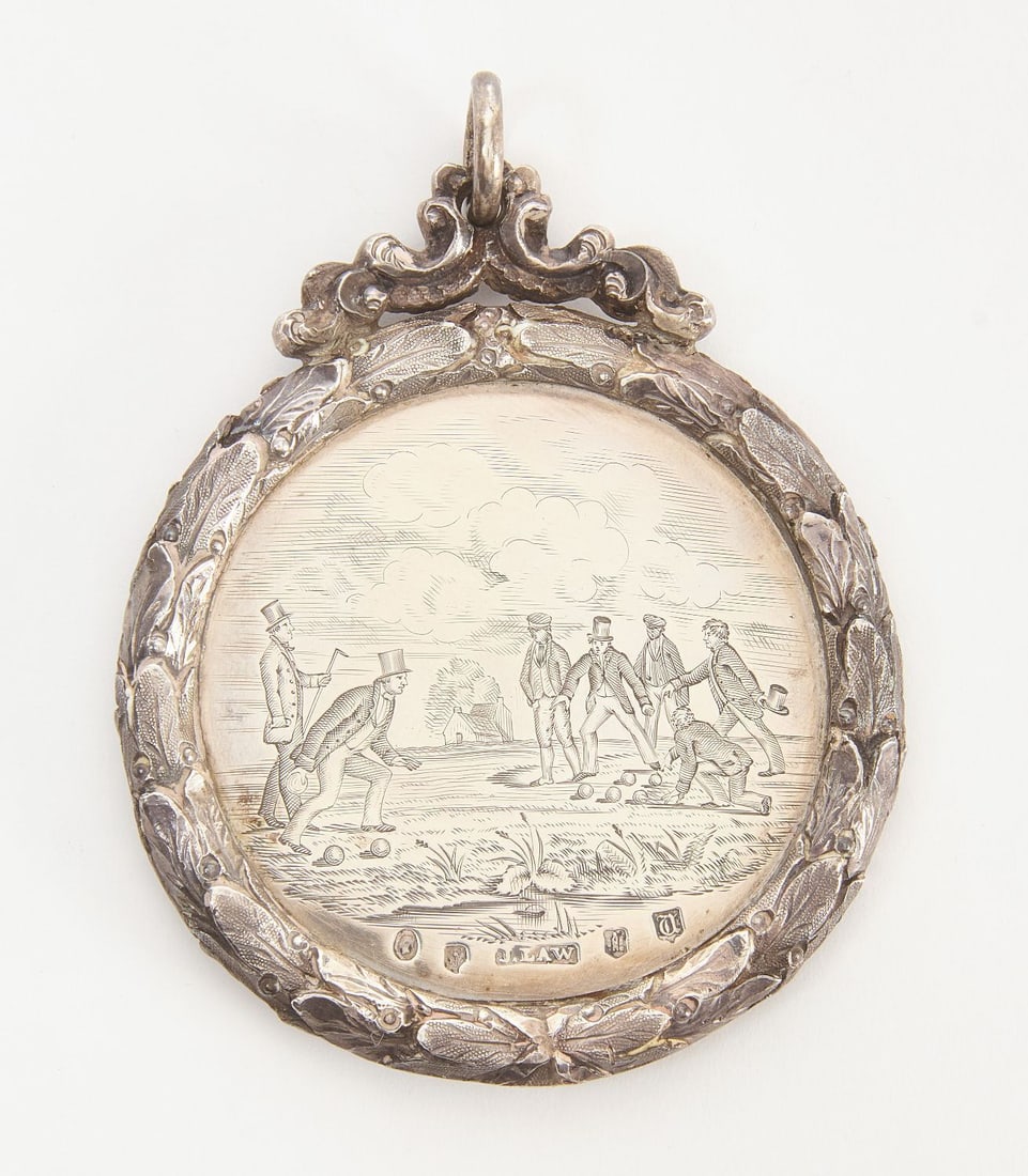 Scottish Bowling Club Presentation Medallion: Lanark (Scotland) Bowling Club silver medallion dated 1852. Front side shows a finely engraved scene of men bowling with J. Law English hallmarks below. D 2-3/8 in. Weight: 2.22 ozt.
