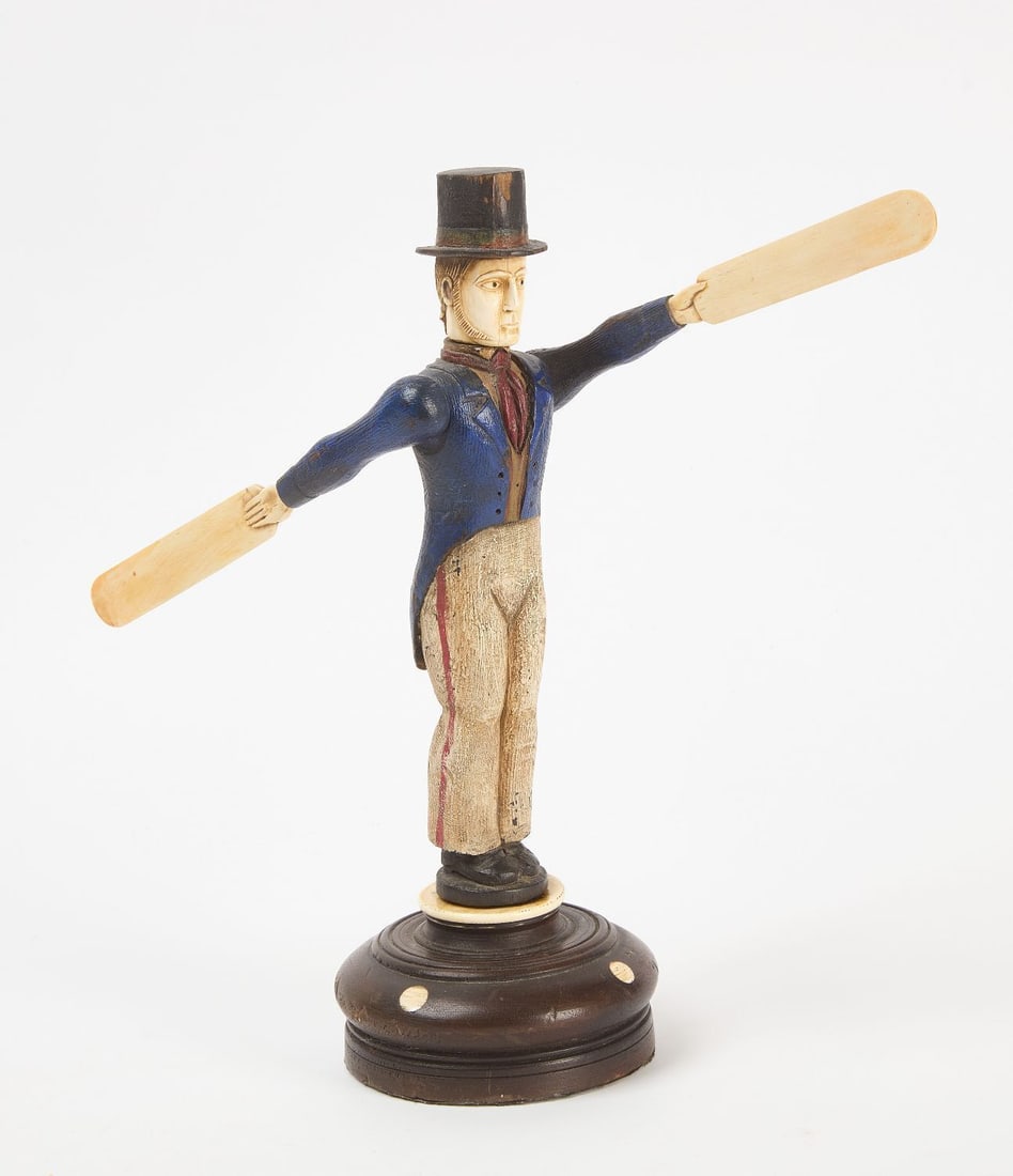 Whirligig Figure of a Man in Tophat: Whirligig figure of a man in tophat and suit. Carved and painted wood body and arms, with bone head and hands/paddles. American, circa 1930. H 12-1/4 in.
