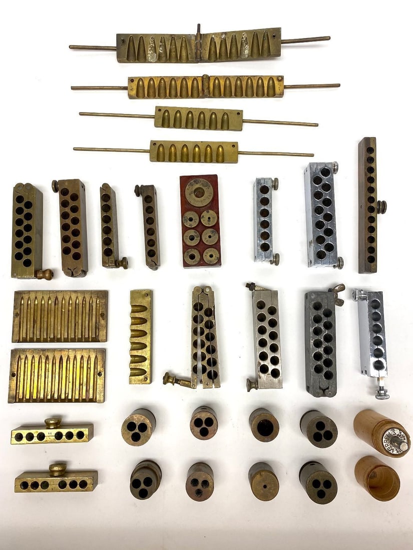 Group of Antique Suppository Molds: Medical anal and vaginal brass suppositories molds. One group of molds inscribed, 'Pat'd. July 6th 1897.' America, late 19th century to early 20th century. 1869 Patent Mold: H 7/8 in. W 1-3/4 in. L 4-