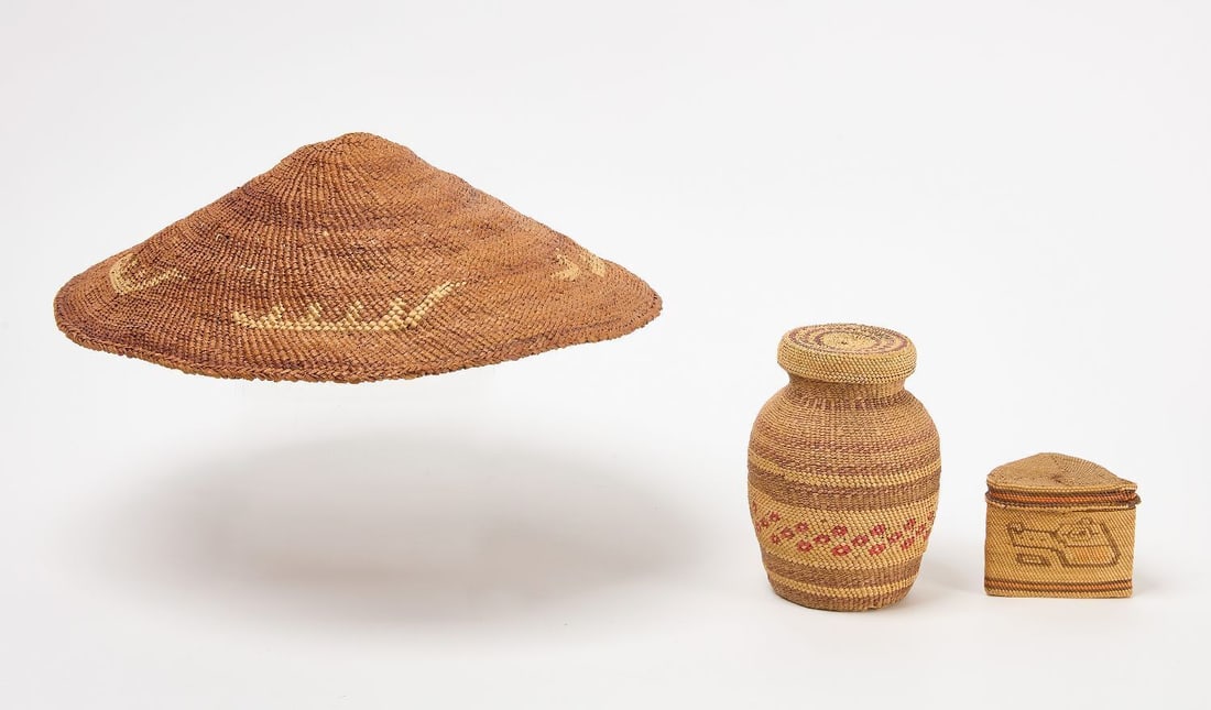 Two Northwest Coast Native Baskets and a Hat: Three Northwest coast Native baskets. Including; a hat with whaling scene, basket-covered pottery jar and a triangular shaped basket. All circa 1900.Hat: D 14-3/8 in. Basket covered pottery jar: H