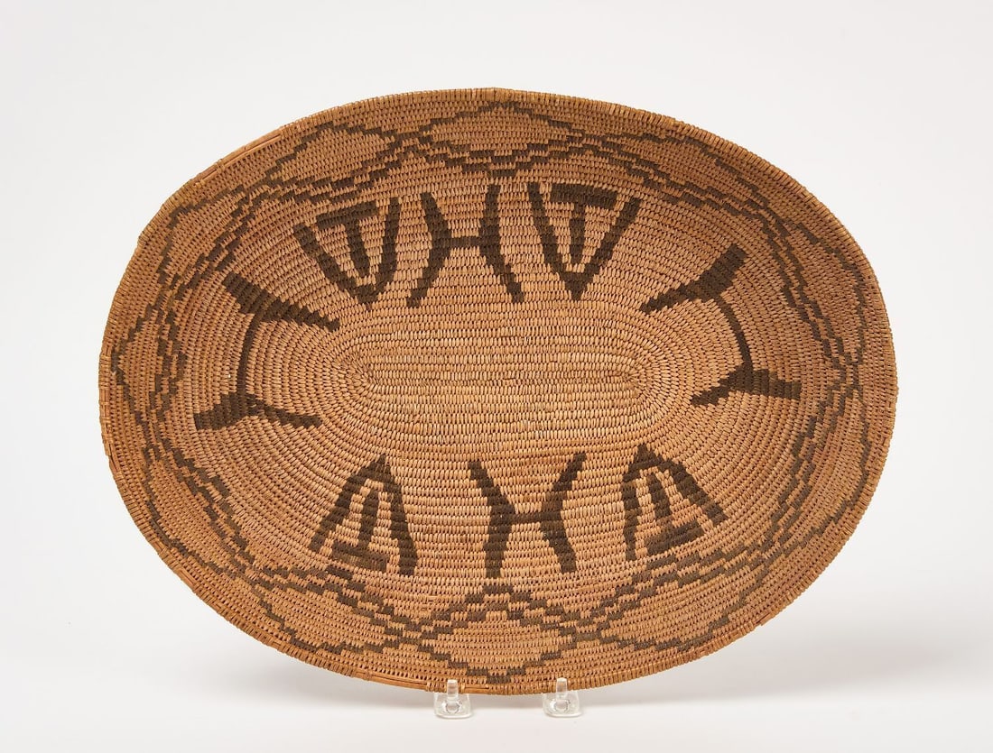 Native American Oval Basket Tray: Native American oval basket tray. Southwestern United States, circa 1900. H 1-1/2 in. L 16 in. W 12-5/8 in.