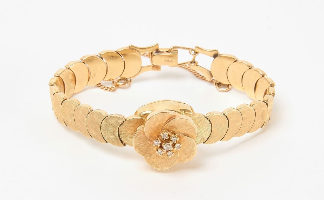 14k Gold Peekaboo Watch: 14k yellow gold peekaboo watch. Swiss movement. Circa 1960. 15.7 dwt. Clasped: D 2-1/8 in.