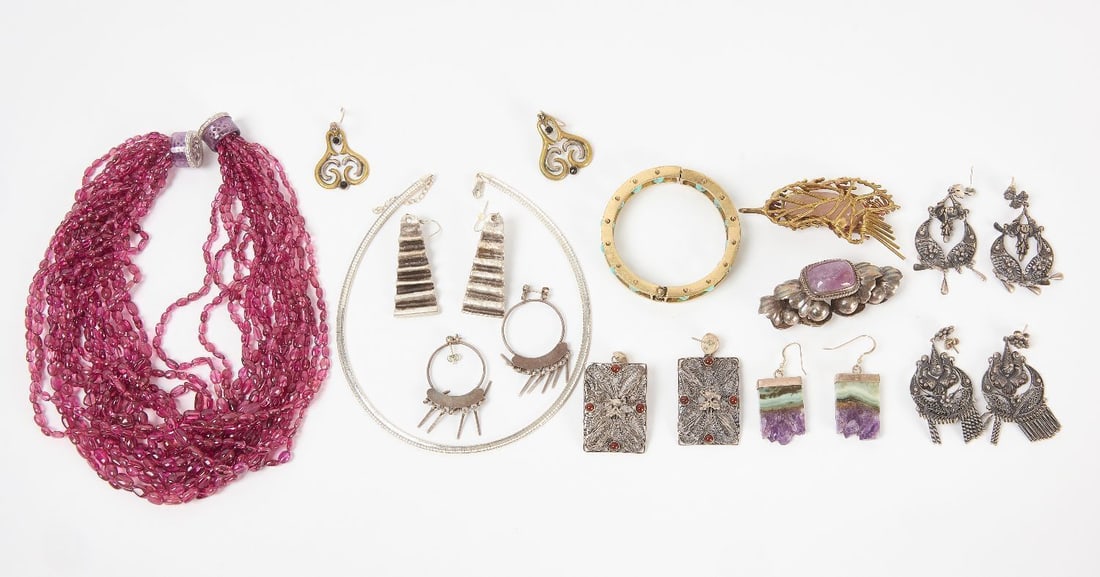 Group of Sterling and Brass Jewelry: Group of sterling silver and brass jewelry including a necklace, pendants, earrings, and others as shown.Silver Weight: 4.8 ozt.