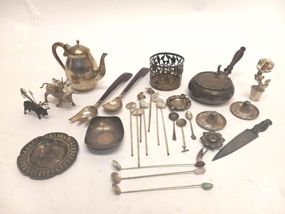 Group of Mexican Silver: Group of Mexican silver, mostly sterling. Includes figural pieces, a coffee pot, several wood-handle items, and others as shown.Total Weight: 58.5 ozt.
