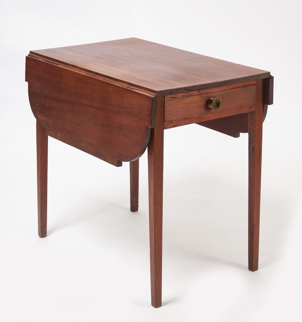 Hepplewhite Drop Leaf Table: Hepplewhite drop leaf table with shaped sides, single drawer, and slightly tapered legs. Likely cherry. New England, circa 1810. Closed: H 28 in. W 20-1/4 in. D 30-3/4 in. Open: H 28 in. W 39-1/4 in.