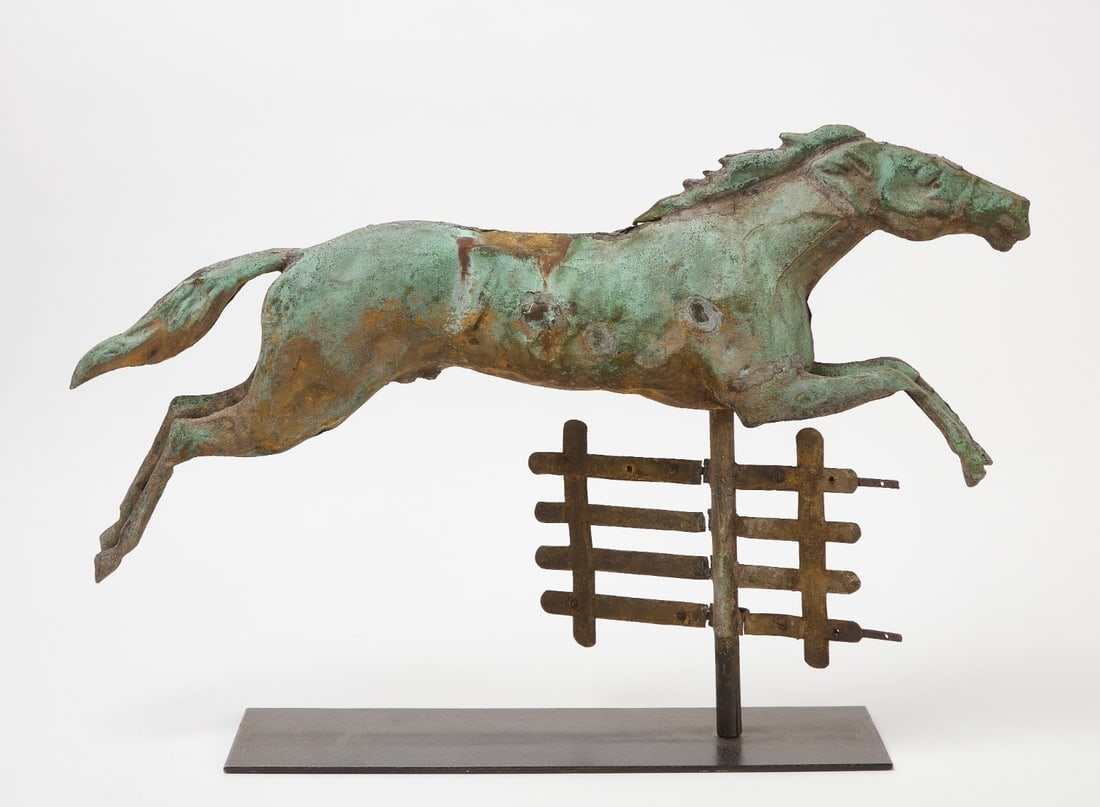 Steeple Chase Horse Weathervane: Steeple chase horse over fence weathervane. Fully hollow-body molded copper. New England, circa 1880. Stand not included with this lot. H 19-1/2 in. L 29-1/2 in. 