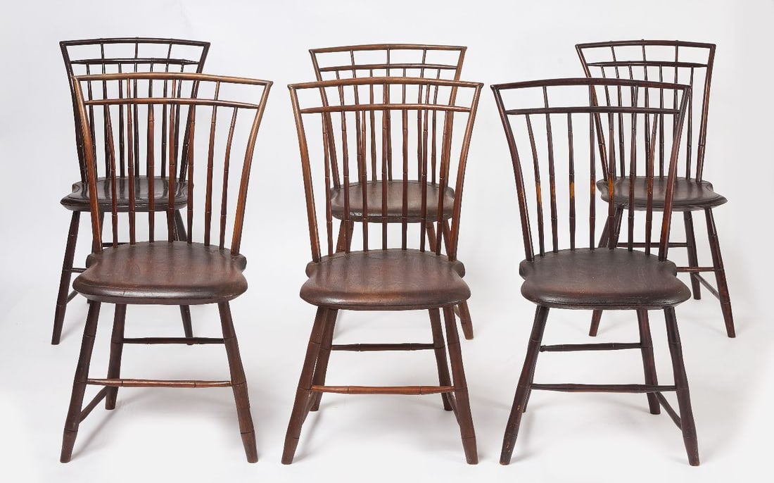Six Birdcage Windsor Chairs: Six birdcage Windsor dining chairs with bamboo turnings. The six are comprised of a 4 matching plus a pair that are closely related. Old finish.New England, circa 1810. H 34 in-35 in.