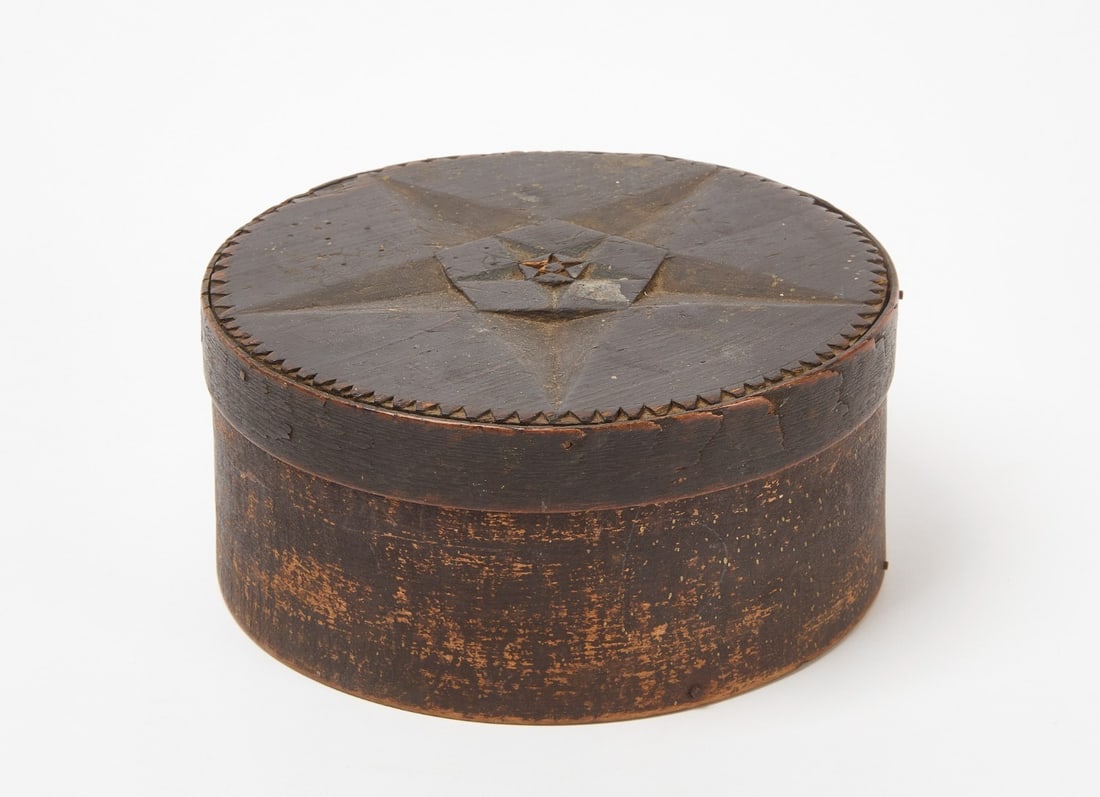 Pantry Box with Star Lid: Pantry box in old black paint with icarved star on lid. New England, mid to late 19th century.H 3 in. D 7-1/4 in.