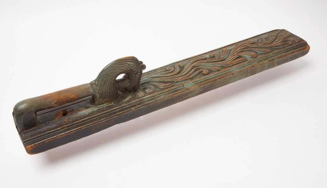 Carved Mangle Board: Mangle board. Carved wood with old blue paint. Scandinavian, early 19th century.H 5 in. L 29 in. 