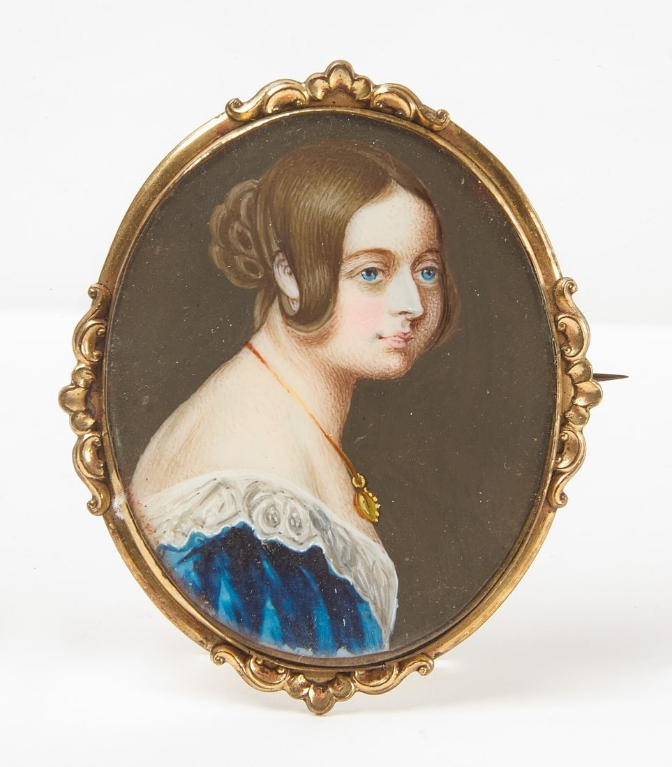 Miniature Portrait of a Blue-Eyed Lady: Miniature portrait on bone of a young lady with blue eyes, wearing a blue dress, and a gold necklace. Gold-filled or plated brooch with pinback. 19th century.H 2-1/8 in. W 1-3/4 in.