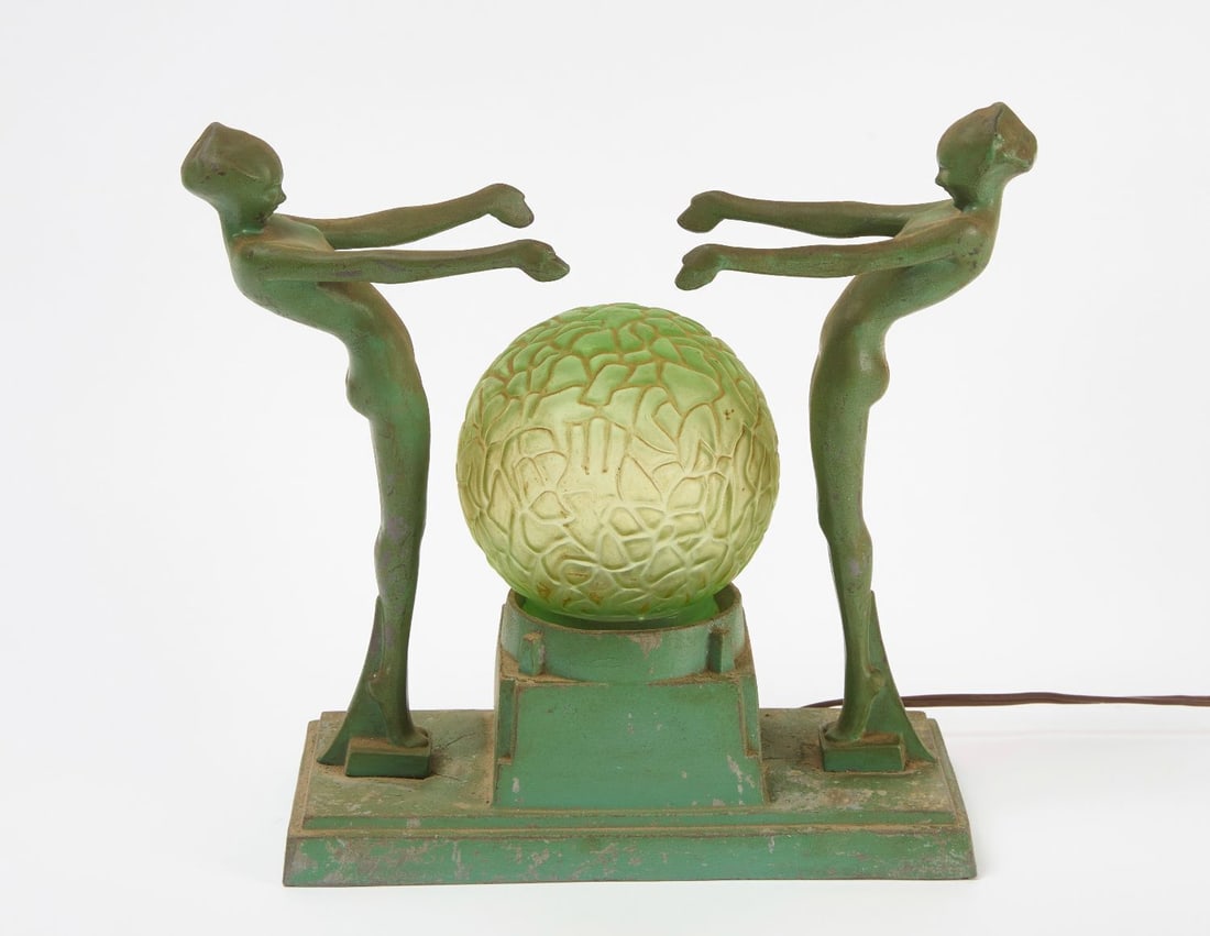 Frankart 'Double Nude' Figural Table Lamp: Frankart 'double nude' figural table lamp depicting two ladies with arms extended above a 'cracked ice' or 'cracked crystal' glass shade. cira 1930.H 11-7/8 in. (Base) L