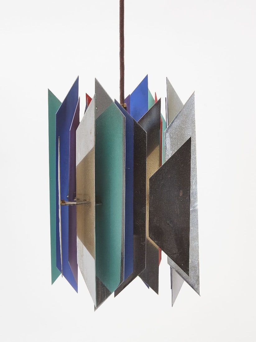 Modernist Tivoli Pendant Lamp: Modernist 'Tivoli' pendant lamp. Multi-faceted chromed metal with polychrome enamel interior. Denmark, circa 1960. H 12 in. D 9 in.