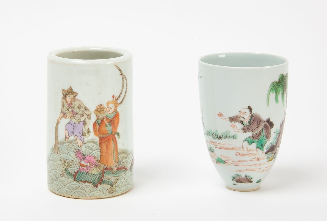 Two Chinese Porcelain Cups: Two Chinese porcelain cups. One with Kangxi region (Qing Dynasty) markings underneath. H 4-5/8 in. D 2-7/8 in. H 4-3/8 in. D 3 in.