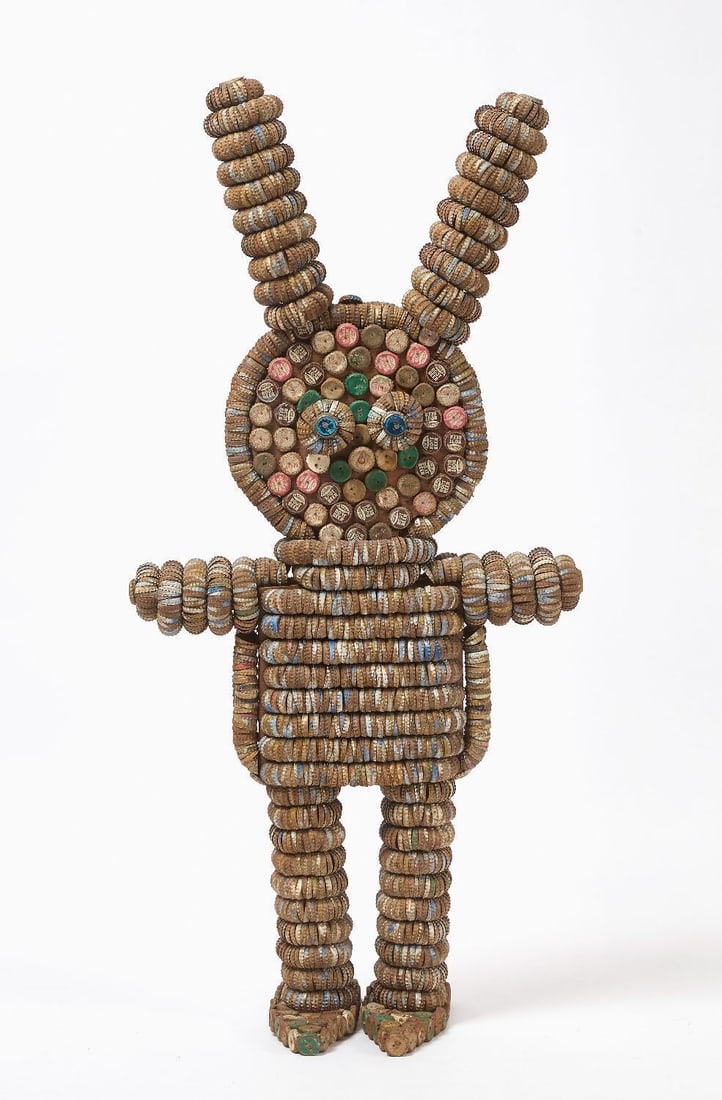 Clarence and Grace Woolsey - Bottle Cap Figure: Clarence (1929-1987) and Grace Woolsey ( - 1992) - Bottle Cap Figure.H 46-1/2 in. W 24-1/2 in D 4 in.Farmhands in Lincoln, Iowa, Grace and Clarence Woolsey were keeping their saved bottle caps in a