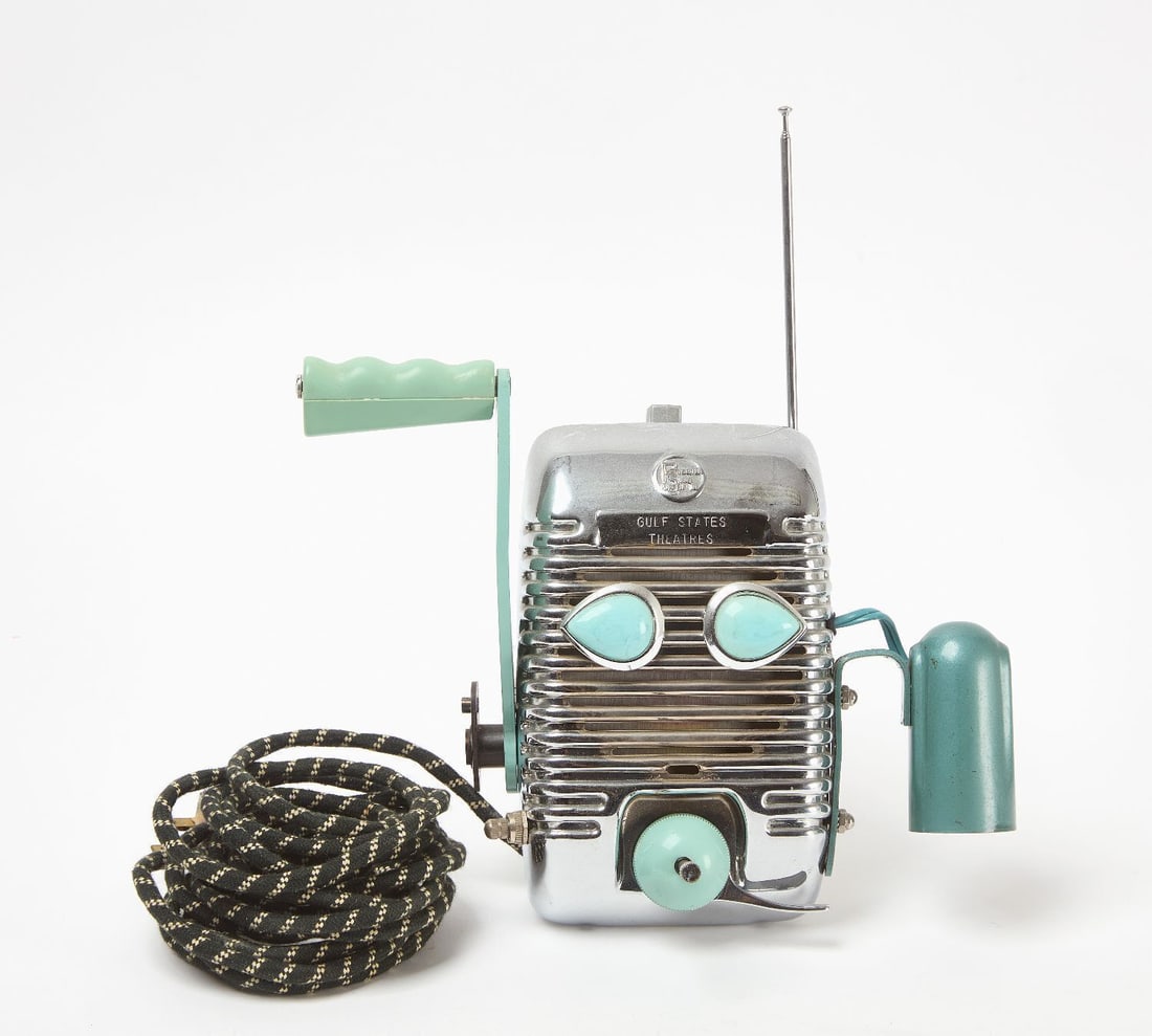 Jimmy Descant - Gulf States Robot Head: Jimmy Descant - Gulf States robot head. Illuminated assemblage, metal outdoor theatre speaker, plastic, metal and glass objects. L 13 in. W 11-1/4 in. Provenance: Purchased directly from