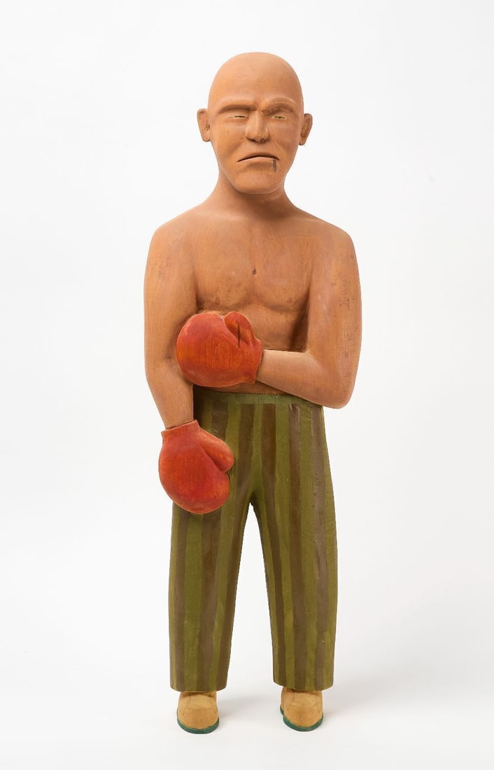 Chris Donnelly - Tougher Than Life: Chris Donnelly (Ann Arbor, Michigan) - 'Tougher Than Life' #132. Carved and painted wood sculpture of a boxer with striped pants. American, 1997. H 29-1/4 in. Provenance: Shelton