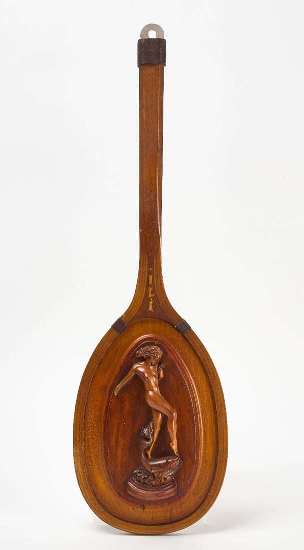 Art Deco Racket Plaque: Carved art deco racket plaque with nude female and fish figure. Inlaid with the vertical monogram/letters, 'i/l/i'. Handcarved wood composition with various materials. America, circa 1920. H