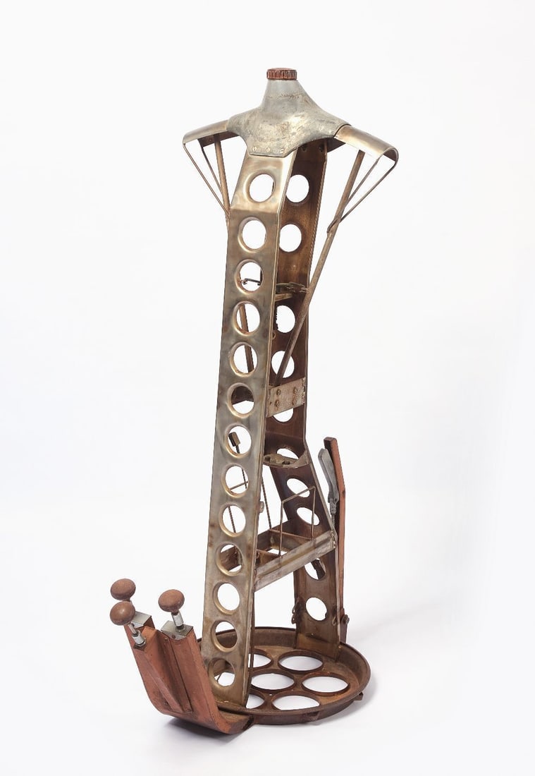 Steamer Dress Form: Steamer dress form. Galvanized metal. Top knob rotates to collapse or expand the shoulders.H 52-1/2 in.