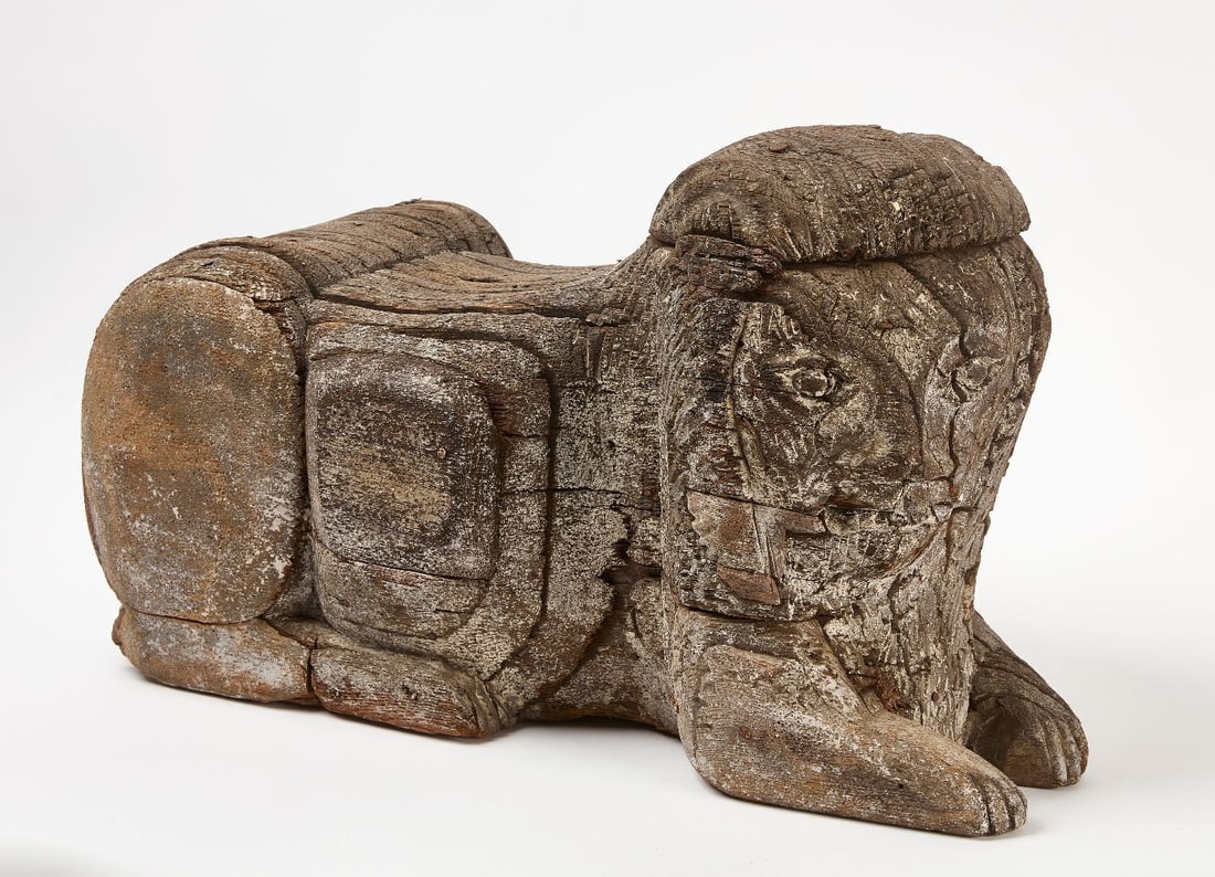 Large Laminated Wood Lion Sculpture: Large laminated wood lion sculpture attributed to Milton Moore (1909–2009, Pittsfield, NY). Wood, nails, glue and traces of paint. America, mid-to-late 20th century. H 16-1/2 in. W 15 in.