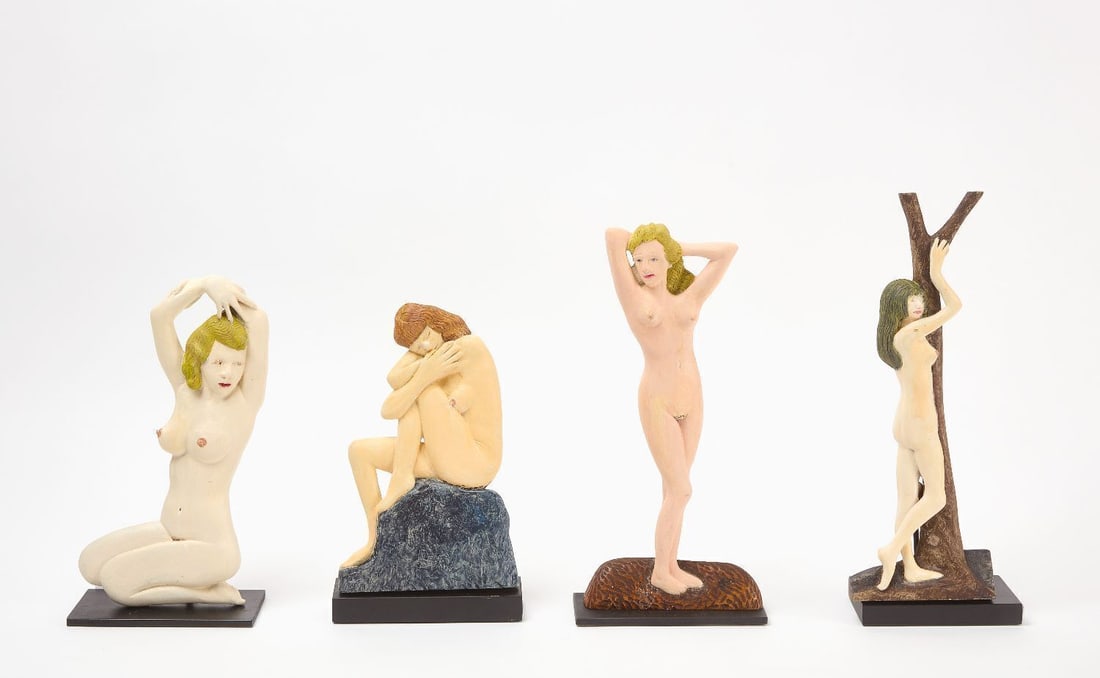 Four Wood Nude Female Figures: Four carved and hand-painted nude female figures. Paint on carved composite wood with custom bases (several magnetic attachments). Anonymous, mid-20th century. Largest (Figure leaning on Tree): H