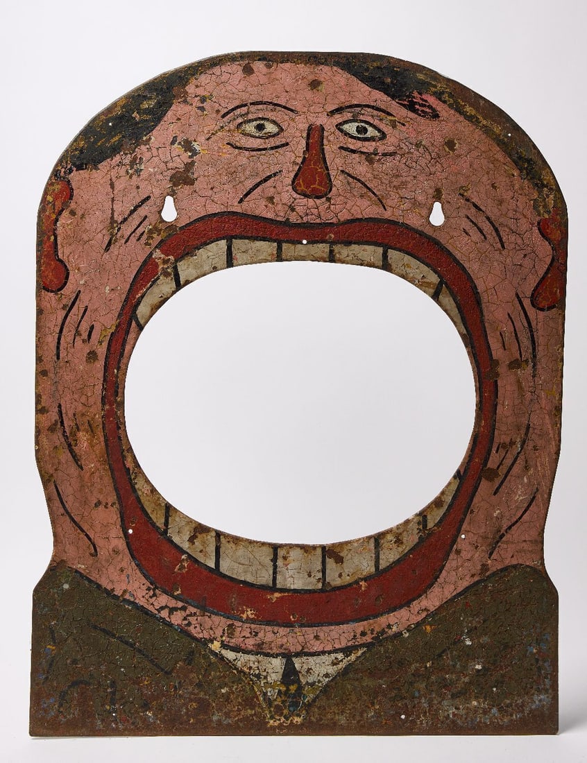 Ball Toss Figure: Ball toss carnival figure. Original paint on heavy sheet iron. American, circa 1920. Overall: H 36 in. W 28 in. Mouth Opening: H 15-1/8 in. W 18-3/4 in.