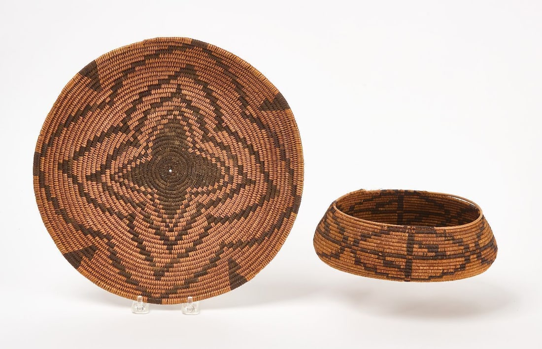 Northwest Coast Coil Tray and Oval Bowl: Northwest Coast coil tray with radiating star motif. Together with an oval bowl. 19th century.D 12 in. and H 2-5/8 in. W 8-3/8 in. D 6-1/2 in. 